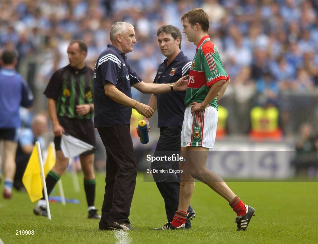 27 August 2006; Mayo's Ronan McGarrity is consoled by team manager Mickey Moran as he leaves the field with an injury. Bank of Ireland All-Ireland Senior Football Championship Semi-Final, Dublin v Mayo, Croke Park, Dublin. Picture credit; Damien Eagers / SPORTSFILE