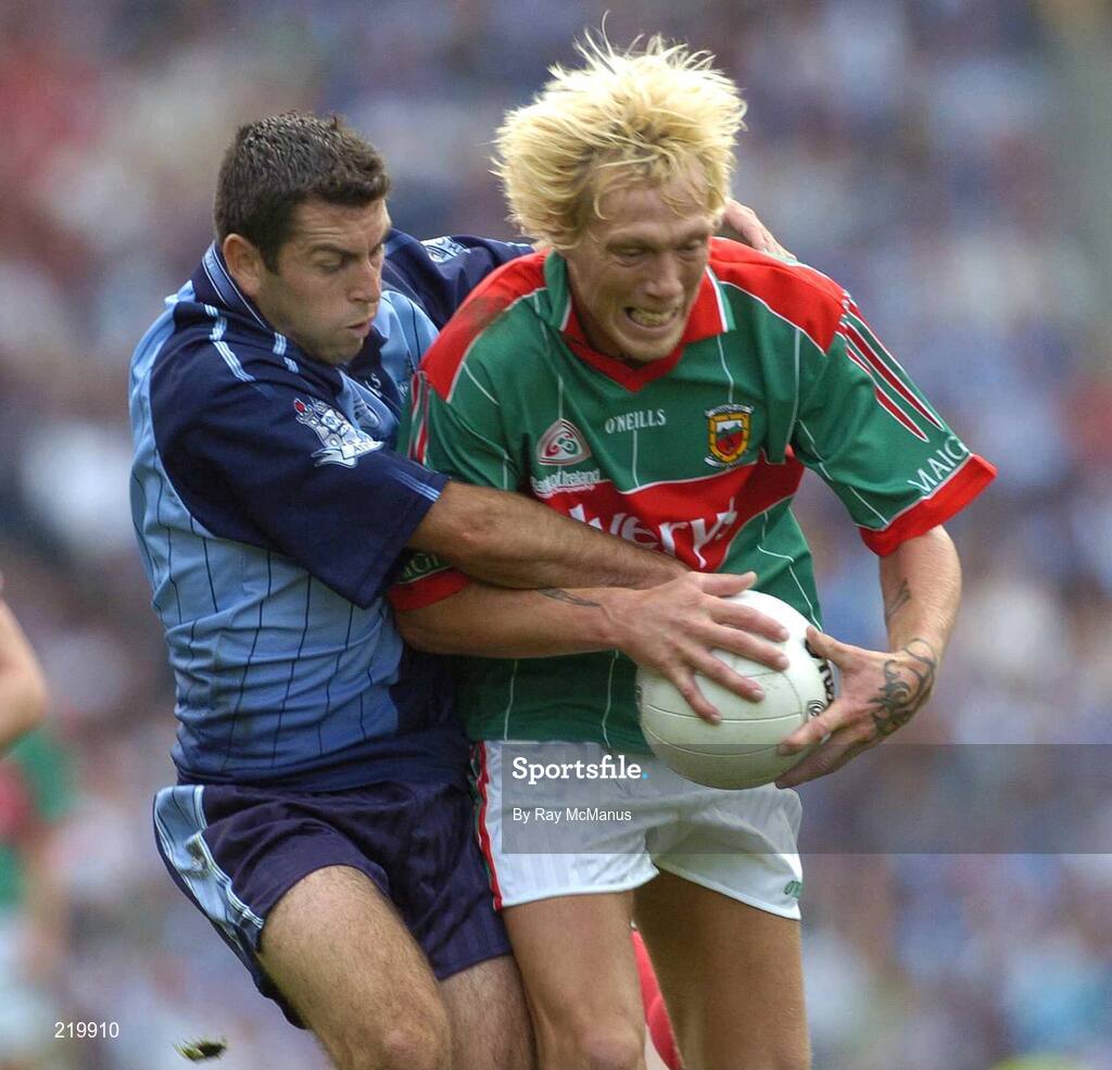 27 August 2006; Ciaran MacDonald, Mayo, is tackled by David Henry, Dublin. Bank of Ireland All-Ireland Senior Football Championship Semi-Final, Dublin v Mayo, Croke Park, Dublin. Picture credit; Ray McManus / SPORTSFILE
