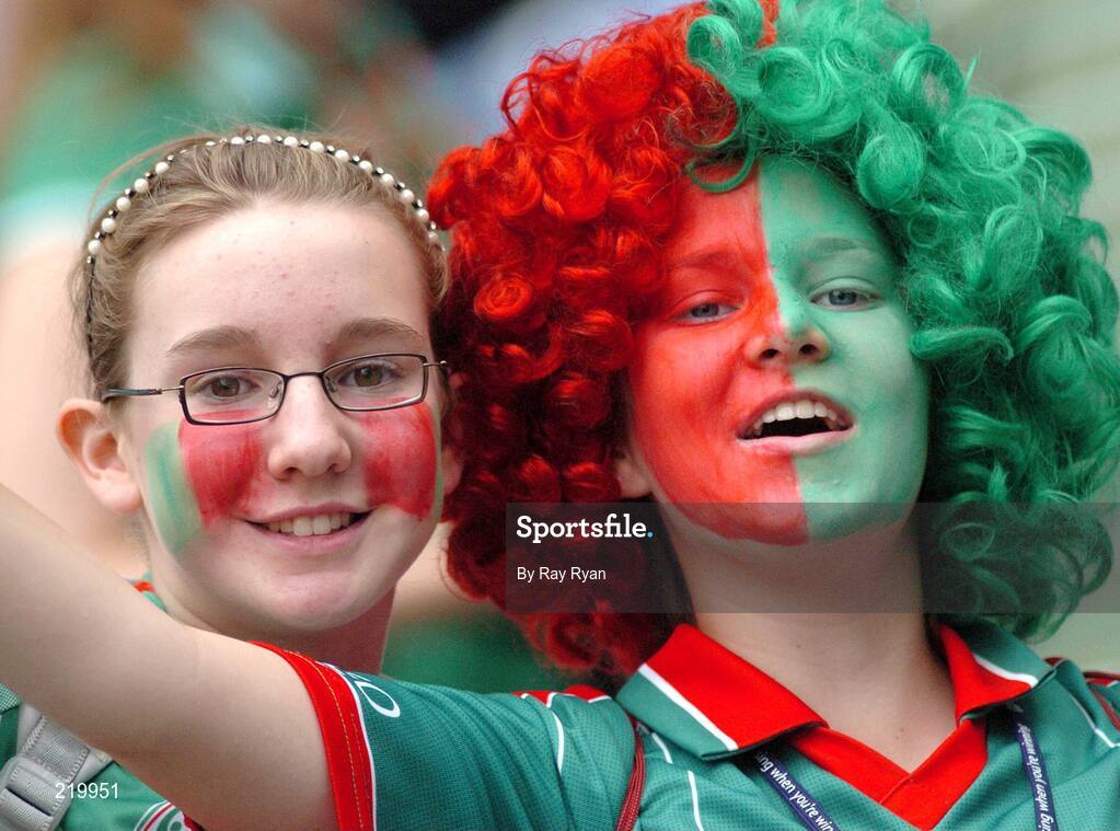 27 August 2006; Éadaoin Moore, and Eve Arnold, left, from Balbriggan, Dublin, but supporters of Mayo cheer on their team. Bank of Ireland All-Ireland Senior Football Championship Semi-Final, Dublin v Mayo, Croke Park, Dublin. Picture credit; Ray Ryan / SPORTSFILE