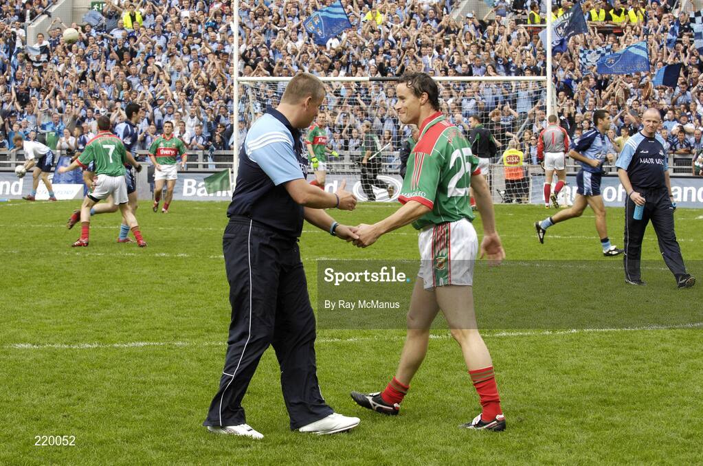 27 August 2006; Dublin manager Paul Caffrey greets his club-mate Kevin O'Neill as the Mayo and Dublin players warm up in front of Hill 16. Bank of Ireland All-Ireland Senior Football Championship Semi-Final, Dublin v Mayo, Croke Park, Dublin. Picture credit; Ray McManus / SPORTSFILE