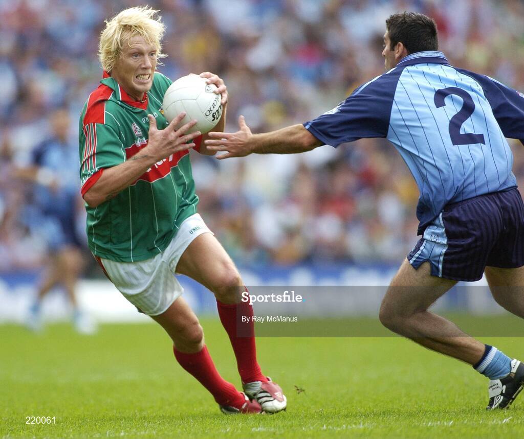 27 August 2006; Ciaran MacDonald, Mayo, is tackled by David Henry, Dublin. Bank of Ireland All-Ireland Senior Football Championship Semi-Final, Dublin v Mayo, Croke Park, Dublin. Picture credit; Ray McManus / SPORTSFILE