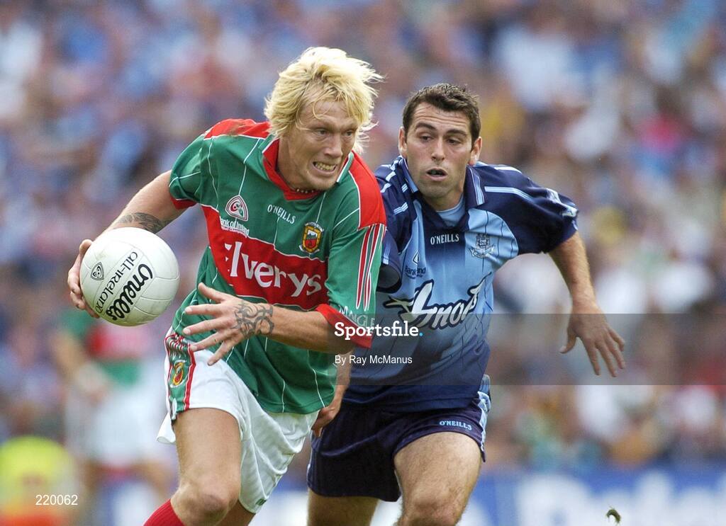 27 August 2006; Ciaran MacDonald, Mayo, is tackled by David Henry, Dublin. Bank of Ireland All-Ireland Senior Football Championship Semi-Final, Dublin v Mayo, Croke Park, Dublin. Picture credit; Ray McManus / SPORTSFILE