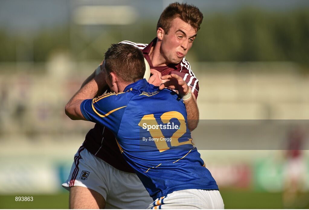 26 July 2014; Paul Conroy, Galway, in action against Peter Acheson, Tipperary. GAA Football All Ireland Senior Championship, Round 4A, Galway v Tipperary. O'Connor Park, Tullamore, Co. Offaly. Picture credit: Barry Cregg / SPORTSFILE