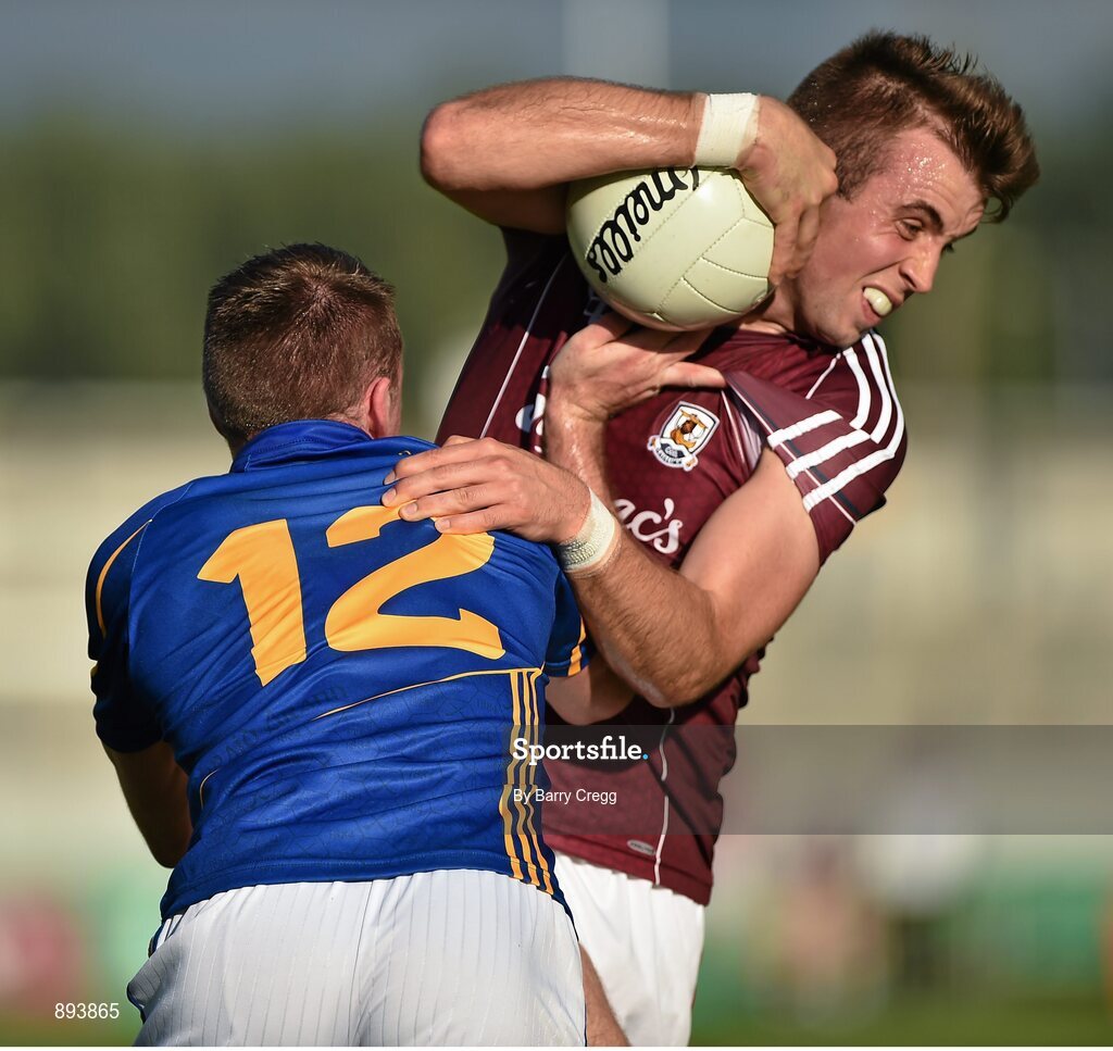 26 July 2014; Paul Conroy, Galway, in action against Peter Acheson, Tipperary. GAA Football All Ireland Senior Championship, Round 4A, Galway v Tipperary. O'Connor Park, Tullamore, Co. Offaly. Picture credit: Barry Cregg / SPORTSFILE