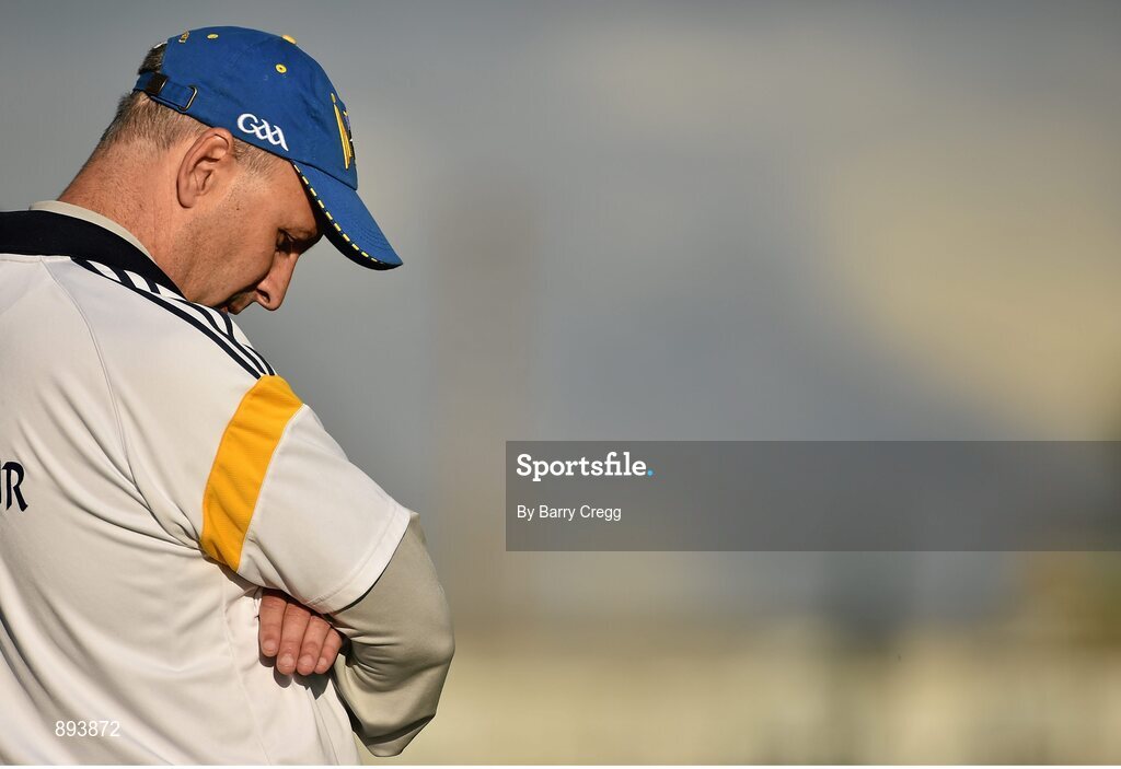 26 July 2014; Tipperary manager Peter Creedon checks the time on his watch during the game. GAA Football All Ireland Senior Championship, Round 4A, Galway v Tipperary. O'Connor Park, Tullamore, Co. Offaly. Picture credit: Barry Cregg / SPORTSFILE