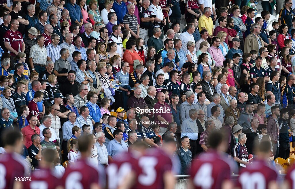26 July 2014; Galway players and supporters from both side's stand for a minute's silence, before the game, in memory of Offaly U21 manager Dermot Hogan who passed away during the week. GAA Football All Ireland Senior Championship, Round 4A, Galway v Tipperary. O'Connor Park, Tullamore, Co. Offaly. Picture credit: Ramsey Cardy / SPORTSFILE