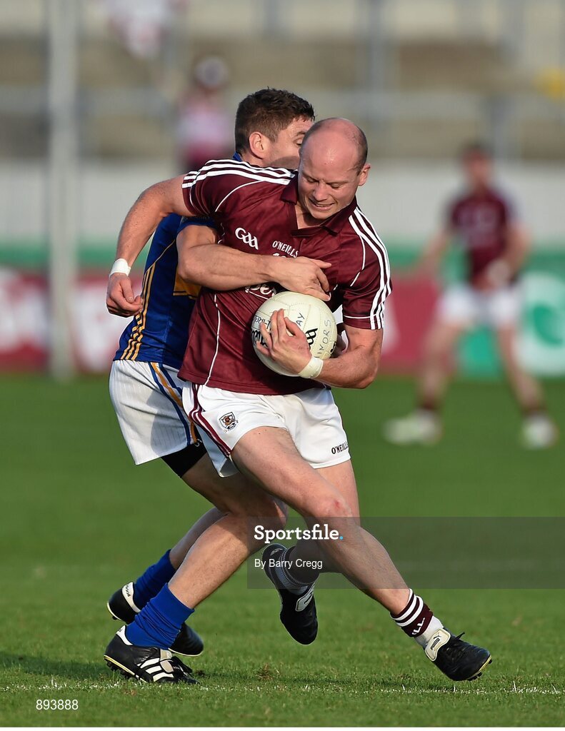 26 July 2014; James Kavanagh, Galway, in action against Philip Austin, Tipperary. GAA Football All Ireland Senior Championship, Round 4A, Galway v Tipperary. O'Connor Park, Tullamore, Co. Offaly. Picture credit: Barry Cregg / SPORTSFILE
