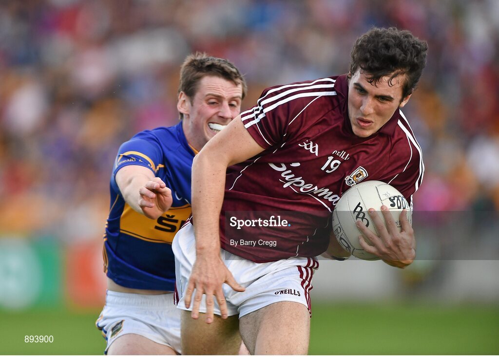 26 July 2014; Daithí Burke, Galway, in action against Conor Sweeney, Tipperary. GAA Football All Ireland Senior Championship, Round 4A, Galway v Tipperary. O'Connor Park, Tullamore, Co. Offaly. Picture credit: Barry Cregg / SPORTSFILE