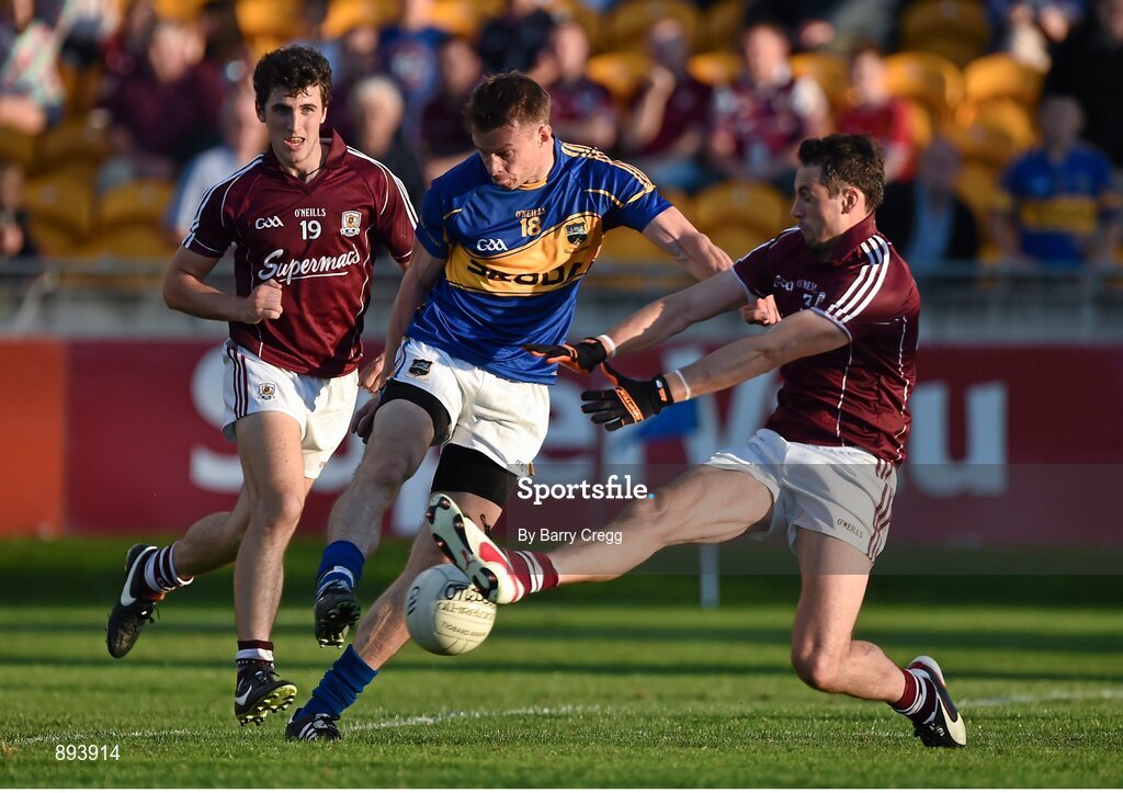 26 July 2014; Hugh Coghlan, Tipperary, in action against Finian Hanley, Galway. GAA Football All Ireland Senior Championship, Round 4A, Galway v Tipperary. O'Connor Park, Tullamore, Co. Offaly. Picture credit: Barry Cregg / SPORTSFILE