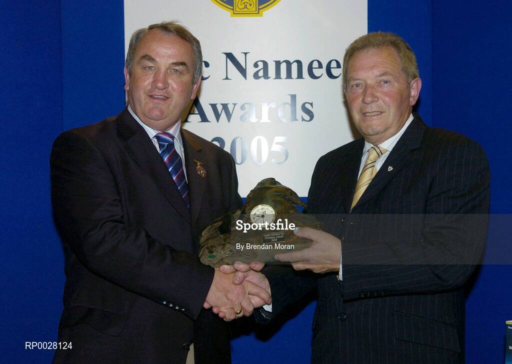15 July 2006; Des Crowe, PRO of the Clare County Board, receives his GAA MacNamee award for "Best County Final Programme" from GAA President Nickey Brennan at the 2006 GAA MacNamee awards. Burlington Hotel, Dublin. Picture credit: Brendan Moran / SPORTSFILE