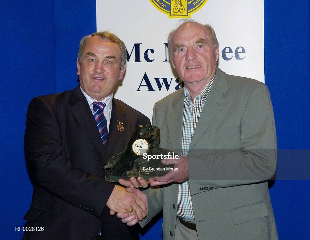 15 July 2006; Seamus King, Tipperary, receives his GAA MacNamee award for "Best County Yearbook" from GAA President Nickey Brennan at the 2006 GAA MacNamee awards. Burlington Hotel, Dublin. Picture credit: Brendan Moran / SPORTSFILE