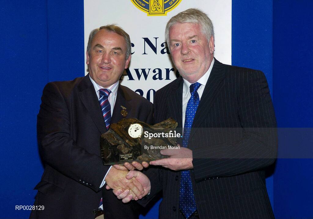 15 July 2006; Eamon O'Sullivan, Secretary of the Kerry County Board, receives their GAA MacNamee Special Merit award on behalf of the Kerry County Board for "Eolaire - Information Booklet for GAA Officials and Supporters" from GAA President Nickey Brennan at the 2006 GAA MacNamee awards. Burlington Hotel, Dublin. Picture credit: Brendan Moran / SPORTSFILE