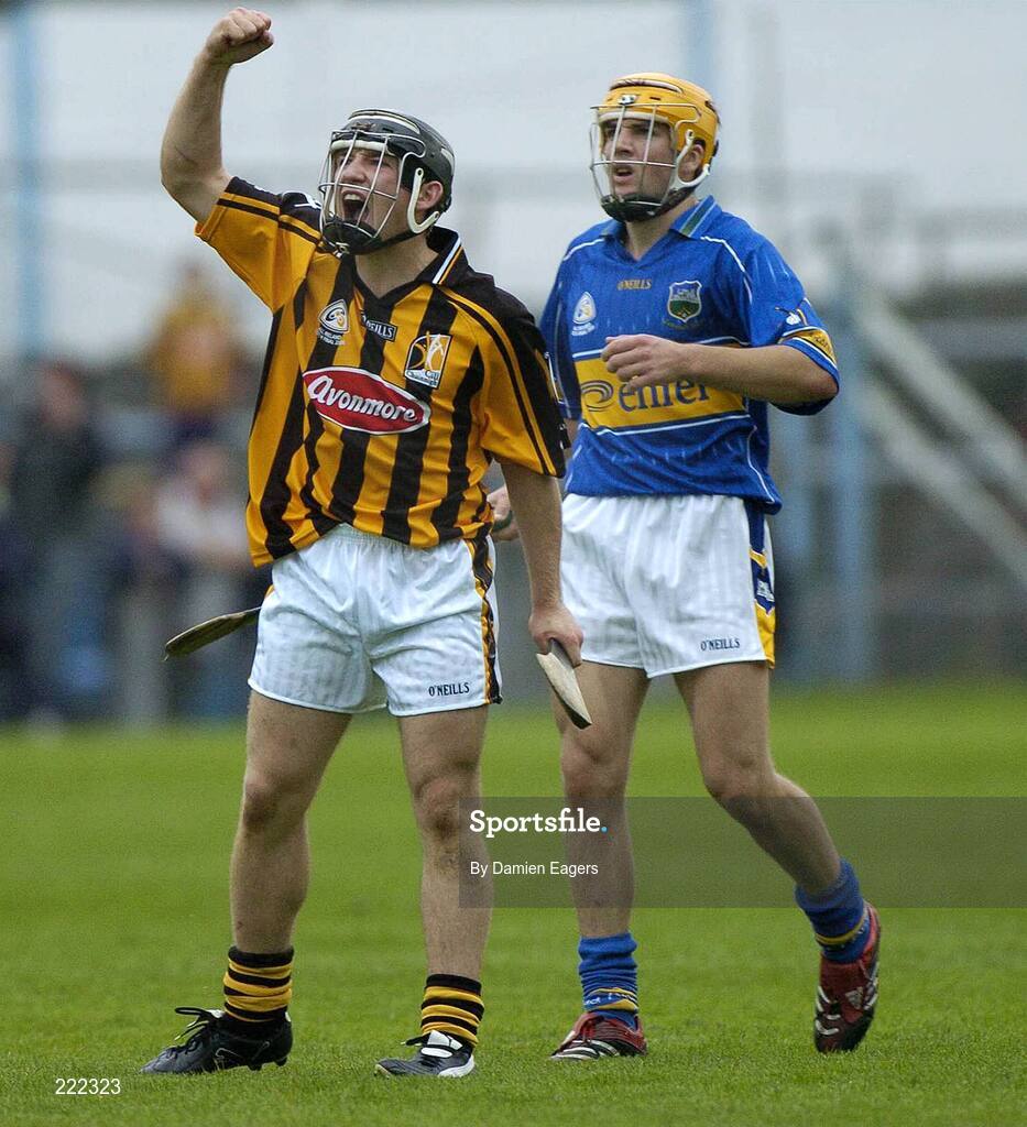 16 September 2006; Kilkenny's Richie Hogan celebrates the last point of the match as Tipperary's James Woodlock looks on. Erin All-Ireland U21 Hurling Championship Final Replay, Tipperary v Kilkenny, Semple Stadium, Thurles. Picture credit: Damien Eagers / SPORTSFILE