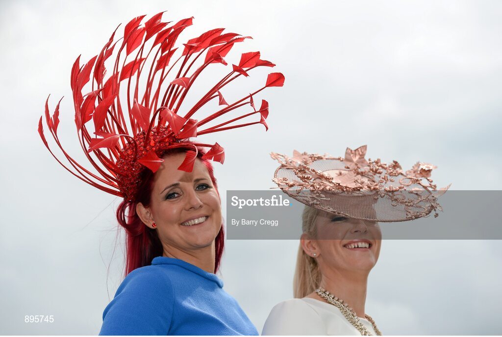 31 July 2014; Joann Murphy, left, and Elaine Kelleher, both from Kilgarvin, Co. Kerry, enjoying a day at the races. Galway Racing Festival, Ballybrit, Co. Galway. Picture credit: Barry Cregg / SPORTSFILE