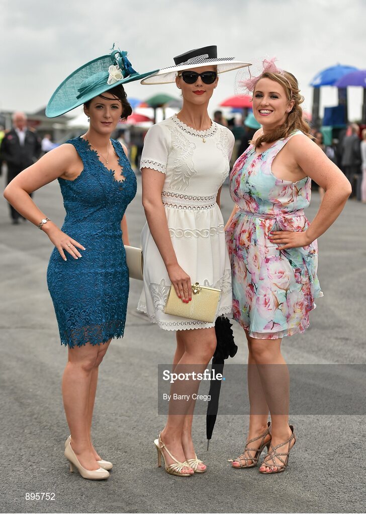 31 July 2014; Pictured are, from left to right, Sadhbh Leamy, from Cashel, Co. Tipperary, Marie Cullimane, from Tourloughmore, Co. Galway, and Avril Treacy, from Newcastlewest, Co. Limerick, enjoying a day at the races. Galway Racing Festival, Ballybrit, Co. Galway. Picture credit: Barry Cregg / SPORTSFILE