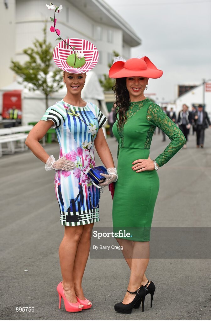 31 July 2014; Aoibhieann McMonagle, left, from Falcarragh, Co. Donegal, and Francesca Leonardi, from Gweedore, Co. Donegal, enjoying a day at the races. Galway Racing Festival, Ballybrit, Co. Galway. Picture credit: Barry Cregg / SPORTSFILE