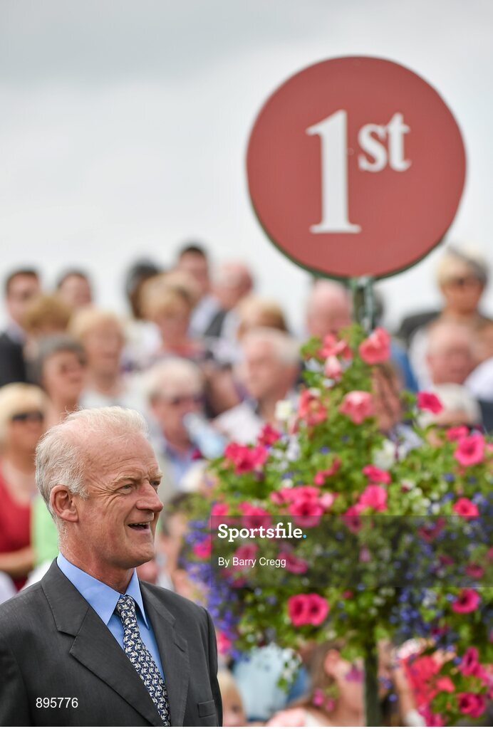 31 July 2014; Trainer Willie Mullins in the winners enclosure after he sent out Alelchi Inois, with Paul Townend up, to win the Guinness Harp Novice Steeplechase. Galway Racing Festival, Ballybrit, Co. Galway. Picture credit: Barry Cregg / SPORTSFILE