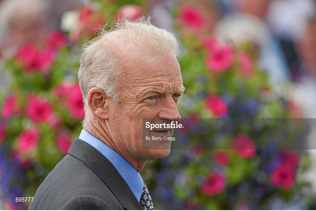 31 July 2014; Trainer Willie Mullins in the winners enclosure after he sent out Alelchi Inois, with Paul Townend up, to win the Guinness Harp Novice Steeplechase. Galway Racing Festival, Ballybrit, Co. Galway. Picture credit: Barry Cregg / SPORTSFILE