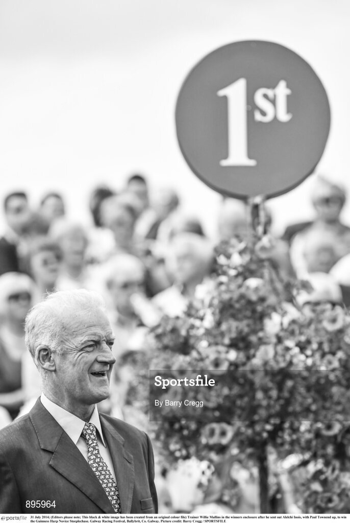 31 July 2014; (Editors please note; This black & white image has been created from an original colour file) Trainer Willie Mullins in the winners enclosure after he sent out Alelchi Inois, with Paul Townend up, to win the Guinness Harp Novice Steeplechase. Galway Racing Festival, Ballybrit, Co. Galway. Picture credit: Barry Cregg / SPORTSFILE