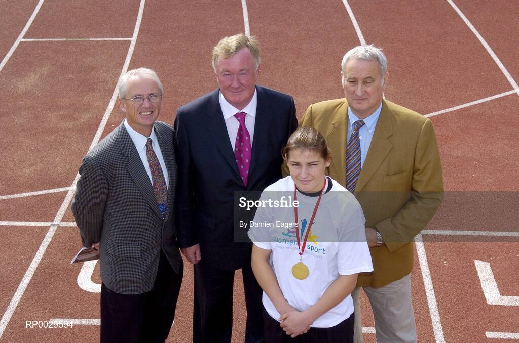 14 September 2006; Minister for Arts, Sport and Tourism, John O'Donoghue, T.D., with Ollie Kilkenny, Chairperson of the Irish Sports Council, right, John Treacy, Chief Executive, Irish Sports Council, left, and Irish Boxer Katie Taylor with her second gold medal in the Women's European Senior Championship at an announcement of the allocation of more than €2 million under the 'Women in Sport' initiative. This initiative has been developed to encourage girls and women into sport and supporting women's roles within sports organisations. Irishtown Athletic Stadium, Ringsend, Dublin. Picture credit: Damien Eagers / SPORTSFILE