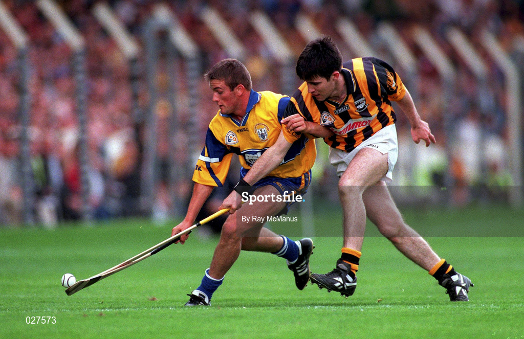 15 August 1999; Alan Markham of Clare is tackled by Philip Larkin of Kilkenny during the Guinness All-Ireland Senior Hurling Championship Semi-Final match between Kilkenny and Clare at Croke Park in Dublin. Photo by Ray McManus/Sportsfile