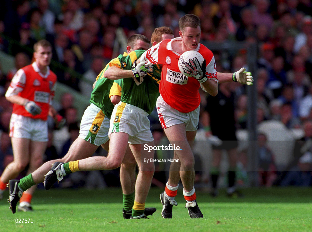 29 August 1999; Andrew McCann of Armagh in action against Donal Curtis of Meath during the Bank of Ireland All-Ireland Senior Football Championship Semi-Final match between Meath and Armagh at Croke Park in Dublin. Photo by Brendan Moran/Sportsfile