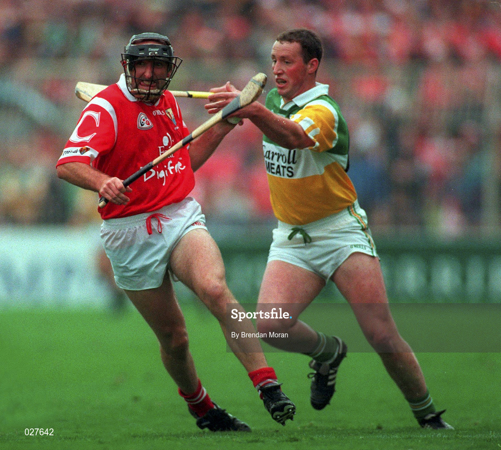 8 August 1999; Brian Corcoran of Cork in action against John Ryan of Offaly during the Guinness All-Ireland Senior Hurling Championship Semi-Final match between Cork and Offaly at Croke Park in Dublin. Photo by Brendan Moran/Sportsfile
