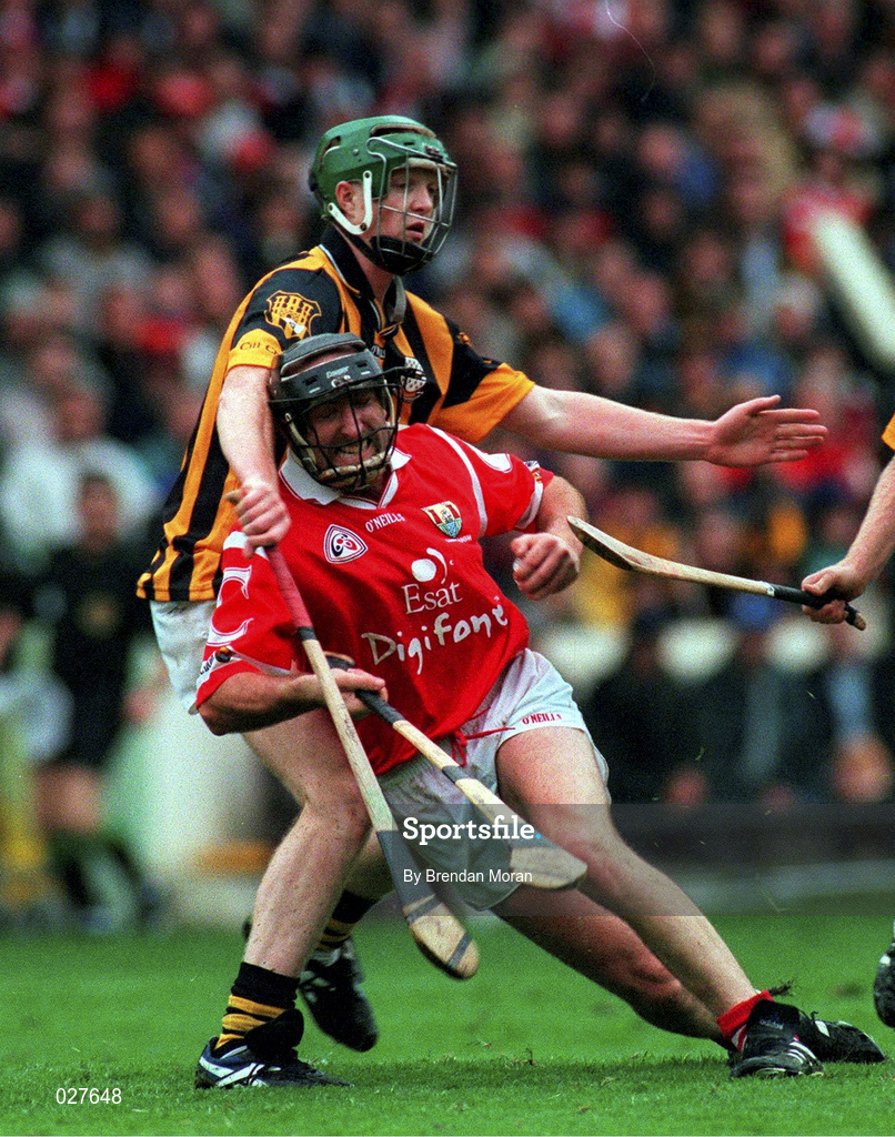 12 September 1999; Brian Corcoran of Cork is tackled by Peter Barry of Kilkenny during the Guinness All-Ireland Senior Hurling Championship Final between Cork and Kilkenny at Croke Park in Dublin. Photo by Brendan Moran/Sportsfile