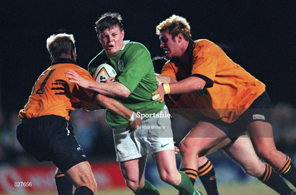 5 June 1999; Brian O'Driscoll of Ireland in action against Lincoln Job, left, and Scott Fava of New South Wales Country during the Ireland Rugby tour to Australia match between New South Wales Country XV and Ireland at the Woy Woy Oval in New South Wales, Australia. Photo by Matt Browne/Sportsfile