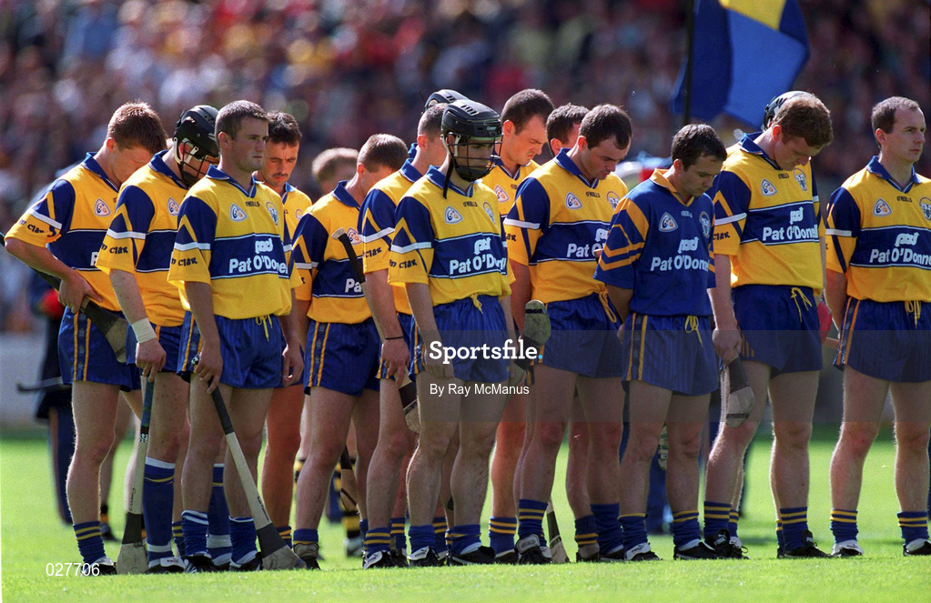 15 August 1999; Clare players stand for a minutes silence, to mark the one year anniversary of the Omagh bombing, prior to the Guinness All-Ireland Senior Hurling Championship Semi-Final match between Kilkenny and Clare at Croke Park in Dublin. Photo by Ray McManus/Sportsfile
