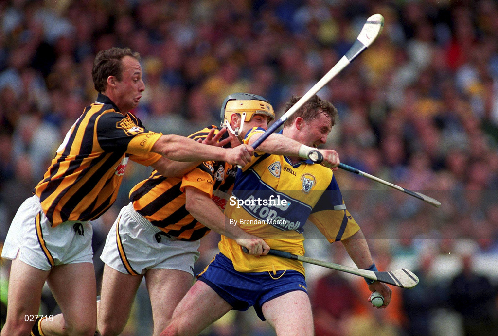 15 August 1999; Conor Clancy of Clare in action against Canice Brennan and Andy Comerford, left, of Kilkenny during the Guinness All-Ireland Senior Hurling Championship Semi-Final match between Kilkenny and Clare at Croke Park in Dublin. Photo by Brendan Moran/Sportsfile