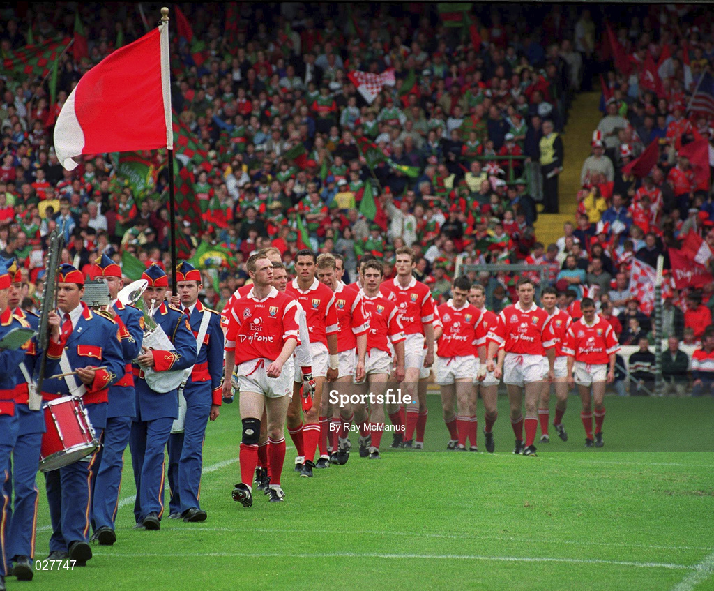 22 August 1999; Cork players follow The Artane Band in the pre-match parade prior to the Bank of Ireland All-Ireland Senior Football Championship Semi-Final match between Cork and Mayo at Croke Park in Dublin. Photo by Ray McManus/Sportsfile