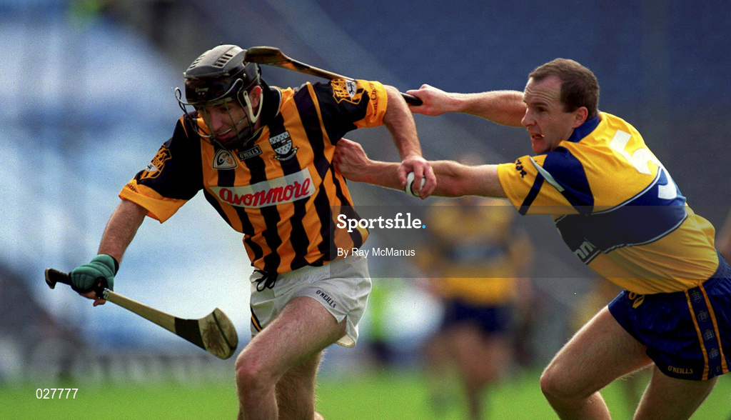 15 August 1999; DJ Carey of Kilkenny is tackled by Liam Doyle of Clare during the Guinness All-Ireland Senior Hurling Championship Semi-Final match between Kilkenny and Clare at Croke Park in Dublin. Photo by Ray McManus/Sportsfile