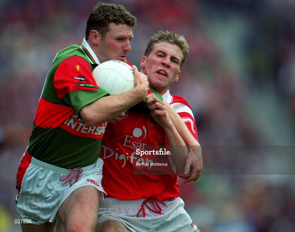 22 August 1999; David Nestor of Mayo in action against Anthony Lynch of Cork during the Bank of Ireland All-Ireland Senior Football Championship Semi-Final match between Cork and Mayo at Croke Park in Dublin. Photo by Ray McManus/Sportsfile