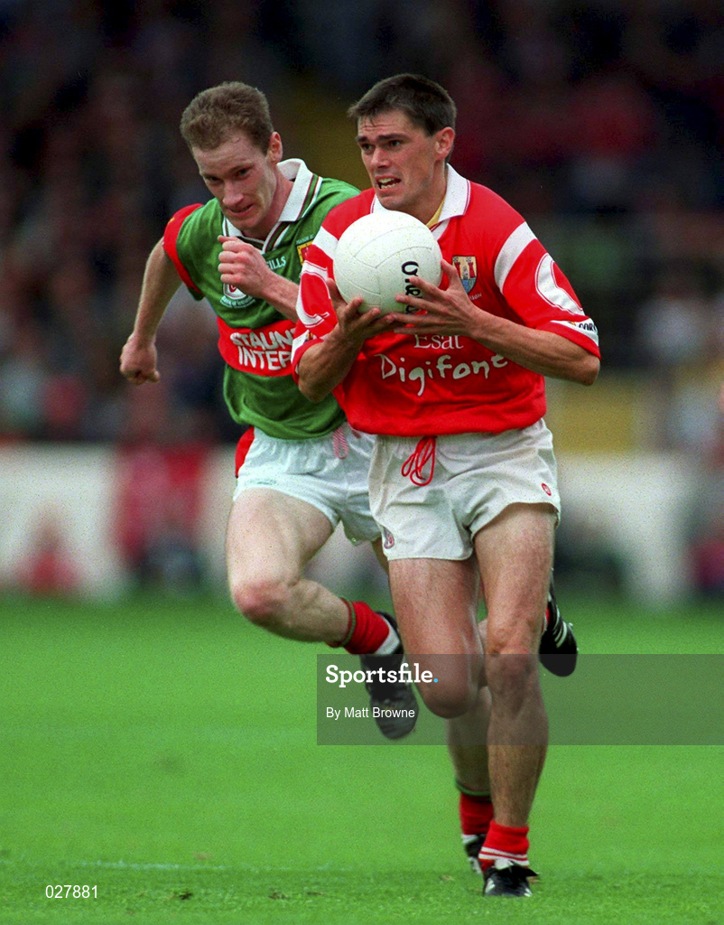22 August 1999; Don Davis of Cork in action against James Nallen of Mayo during the Bank of Ireland All-Ireland Senior Football Championship Semi-Final match between Cork and Mayo at Croke Park in Dublin. Photo by Matt Browne/Sportsfile