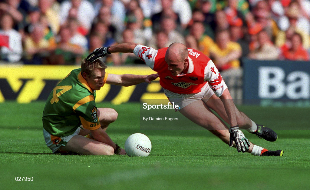 29 August 1999; Gerard Reid of Armagh in action against Graham Geraghty of Meath during the Bank of Ireland All-Ireland Senior Football Championship Semi-Final match between Meath and Armagh at Croke Park in Dublin. Photo by Damien Eagers/Sportsfile