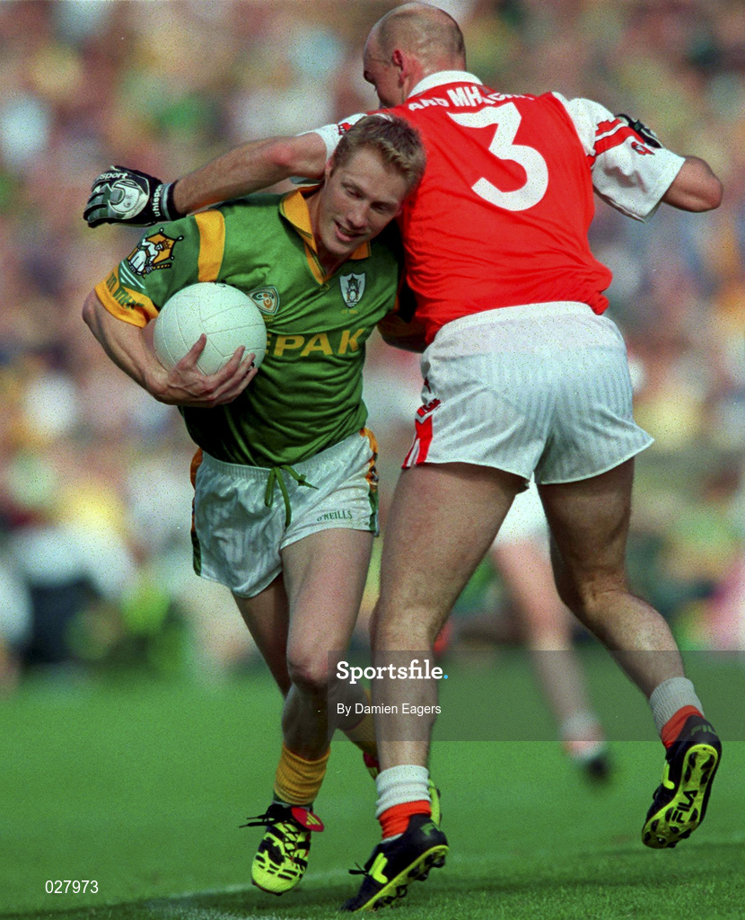 29 August 1999; Graham Geraghty of Meath is tackled by Gerard Reid of Armagh during the Bank of Ireland All-Ireland Senior Football Championship Semi-Final match between Meath and Armagh at Croke Park in Dublin. Photo by Damien Eagers/Sportsfile