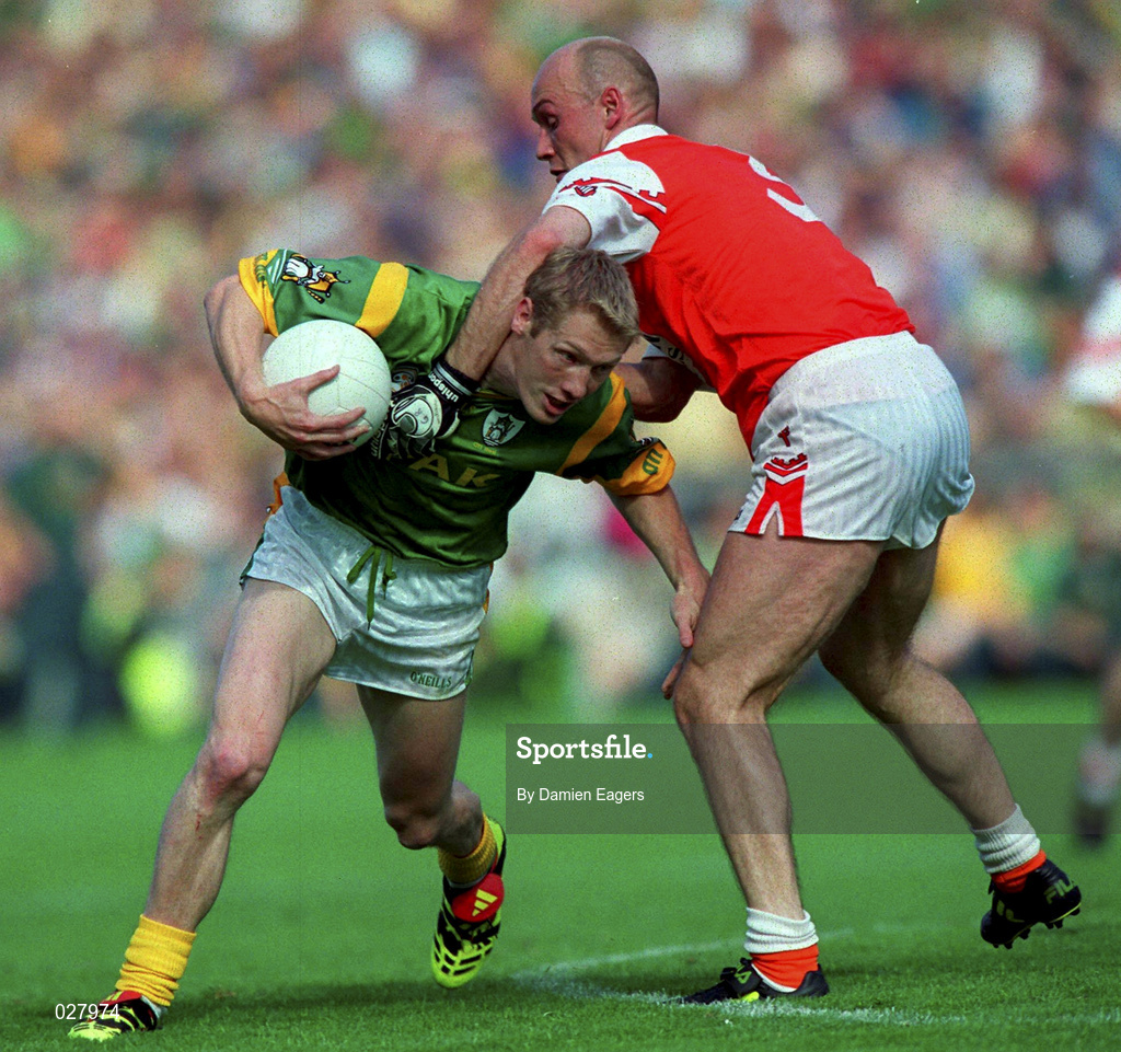 29 August 1999; Graham Geraghty of Meath is tackled by Gerard Reid of Armagh during the Bank of Ireland All-Ireland Senior Football Championship Semi-Final match between Meath and Armagh at Croke Park in Dublin. Photo by Damien Eagers/Sportsfile