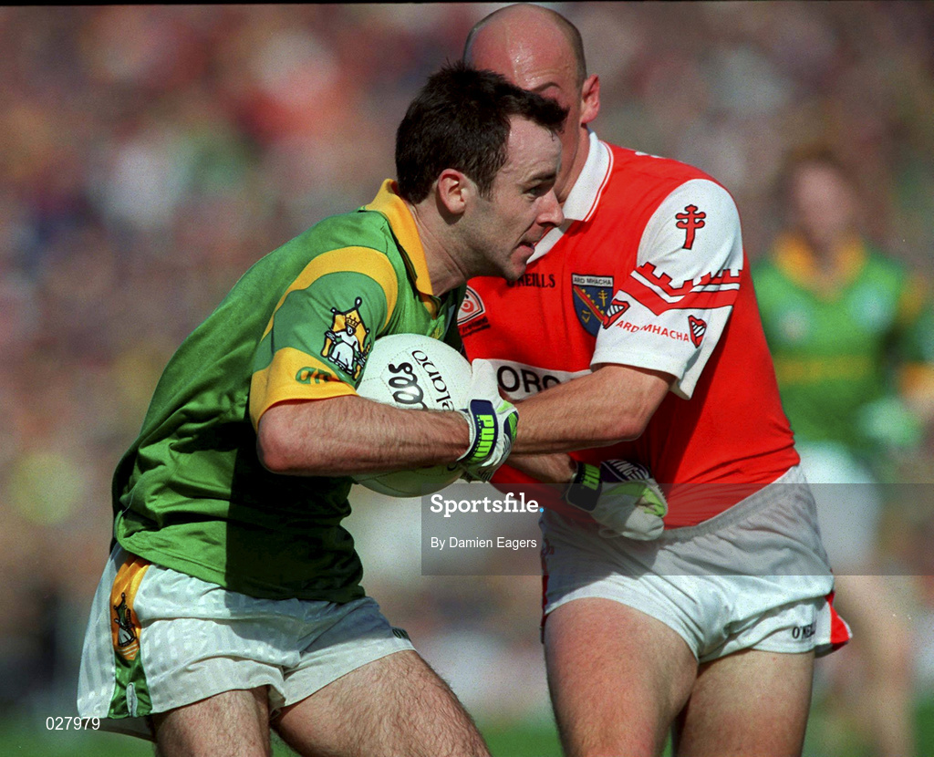 29 August 1999; Hank Traynor of Meath is tackled by Gerard Reid of Armagh during the Bank of Ireland All-Ireland Senior Football Championship Semi-Final match between Meath and Armagh at Croke Park in Dublin. Photo by Damien Eagers/Sportsfile