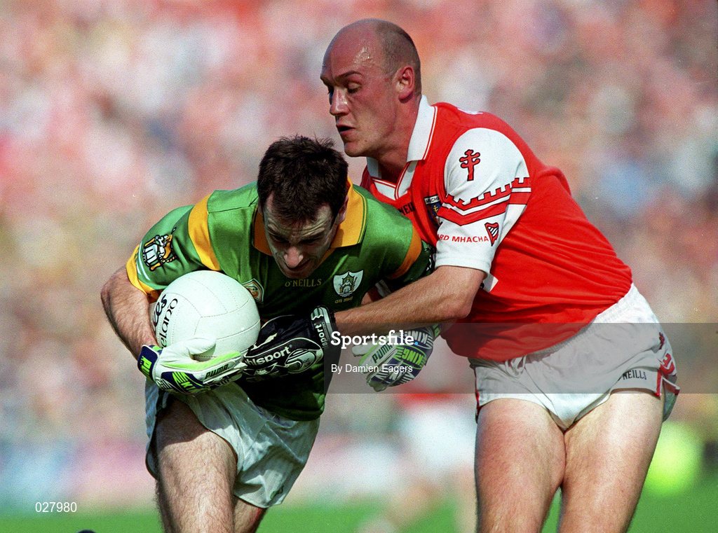 29 August 1999; Hank Traynor of Meath is tackled by Gerard Reid of Armagh during the Bank of Ireland All-Ireland Senior Football Championship Semi-Final match between Meath and Armagh at Croke Park in Dublin. Photo by Damien Eagers/Sportsfile