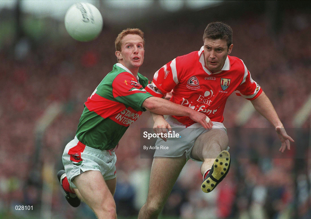 22 August 1999; Joe Kavanagh of Cork in action against Gordon Morley of Mayo during the Bank of Ireland All-Ireland Senior Football Championship Semi-Final match between Cork and Mayo at Croke Park in Dublin. Photo by Aoife Rice/Sportsfile