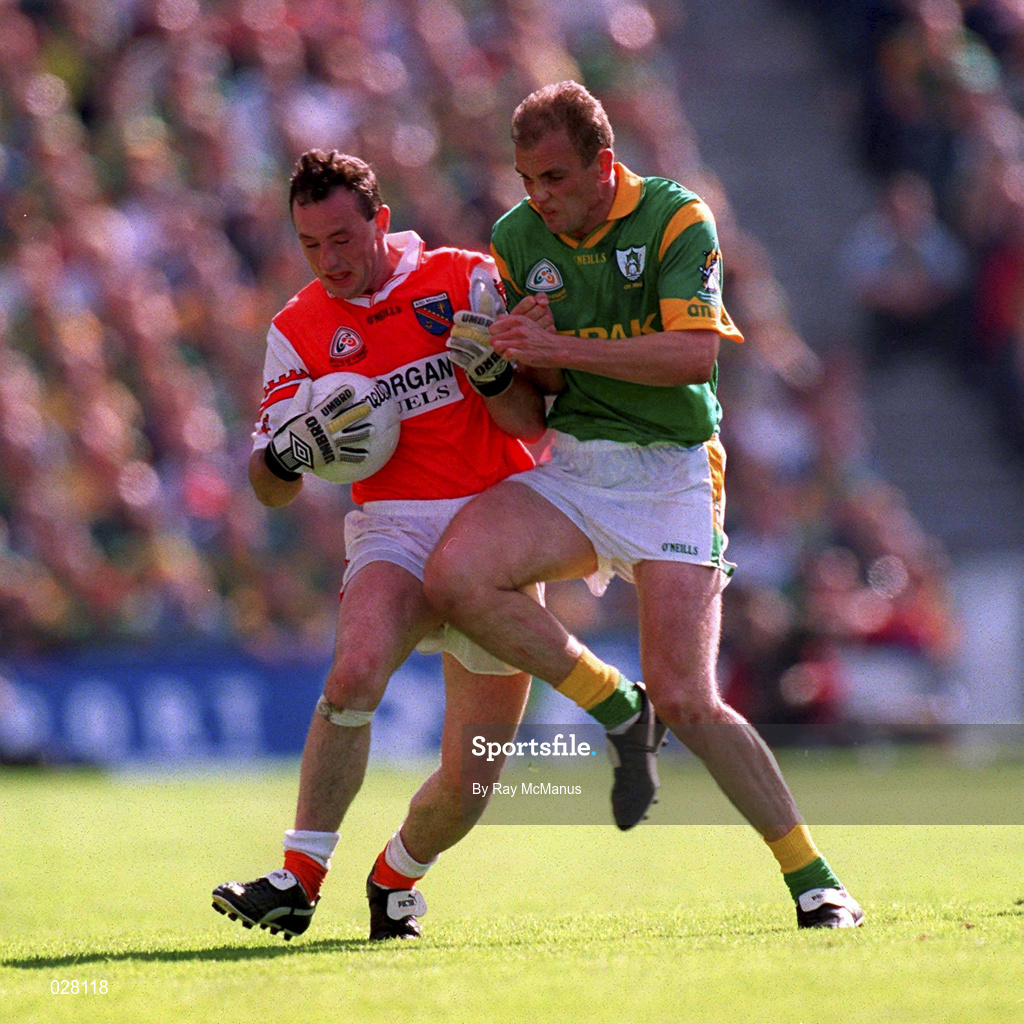 29 August 1999; John Donaldson of Armagh in action against John McDermott of Meath during the Bank of Ireland All-Ireland Senior Football Championship Semi-Final match between Meath and Armagh at Croke Park in Dublin. Photo by Ray McManus/Sportsfile