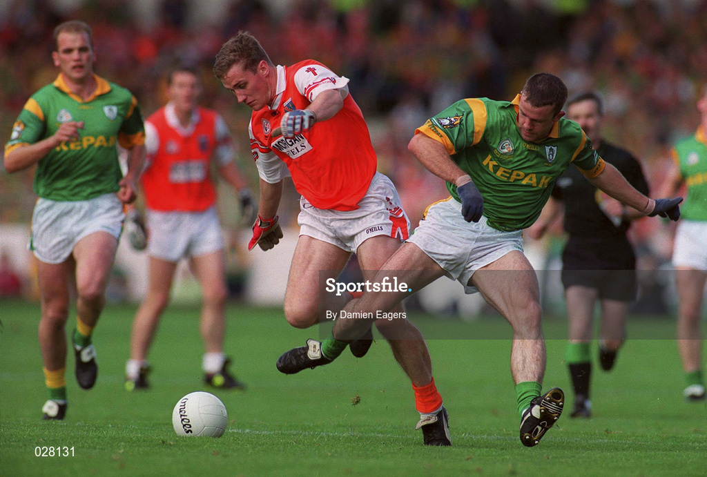 29 August 1999; John McEntee of Armagh in action against Evan Kelly of Meath during the Bank of Ireland All-Ireland Senior Football Championship Semi-Final match between Meath and Armagh at Croke Park in Dublin. Photo by Damien Eagers/Sportsfile