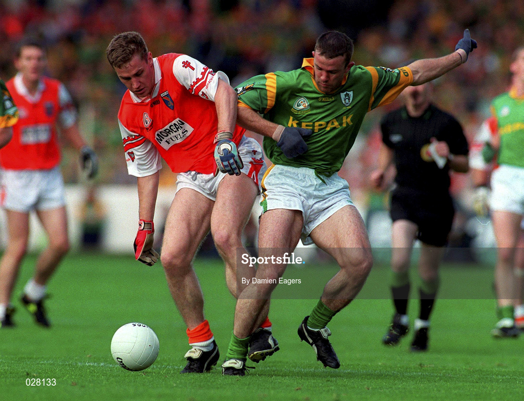 29 August 1999; John McEntee of Armagh is tackled by Evan Kelly of Meath during the Bank of Ireland All-Ireland Senior Football Championship Semi-Final match between Meath and Armagh at Croke Park in Dublin. Photo by Damien Eagers/Sportsfile