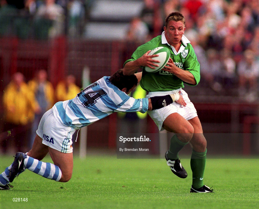 28 August 1999; Justin Bishop of  Ireland is tackled by Diego Albanese of Argentina during the Rugby World Cup Warm-up match between Ireland and Argentina at Lansdowne Road in Dublin. Photo by Brendan Moran/Sportsfile
