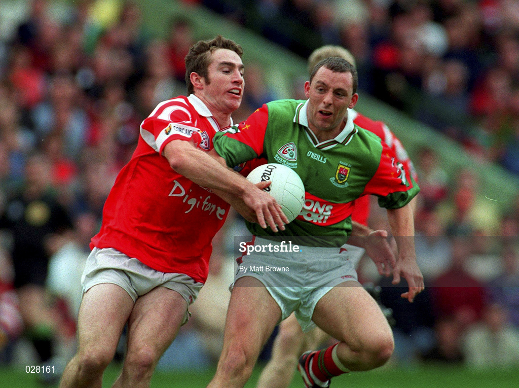 22 August 1999; Kenneth Mortimer of Mayo is tackled Nicholas Murphy of Cork during the Bank of Ireland All-Ireland Senior Football Championship Semi-Final match between Cork and Mayo at Croke Park in Dublin. Photo by Matt Browne/Sportsfile