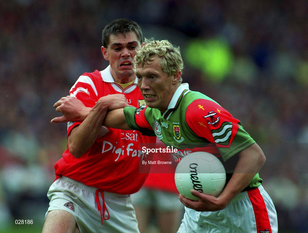 22 August 1999; Ciaran McDonald of Mayo in action against Don Davis of Cork during the Bank of Ireland All-Ireland Senior Football Championship Semi-Final match between Cork and Mayo at Croke Park in Dublin. Photo by Matt Browne/Sportsfile
