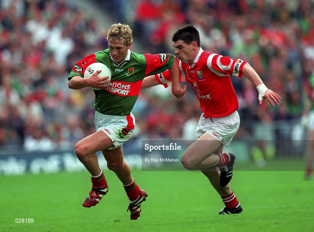 22 August 1999; Ciaran McDonald of Mayo in action against Michael Cronin of Cork during the Bank of Ireland All-Ireland Senior Football Championship Semi-Final match between Cork and Mayo at Croke Park in Dublin. Photo by Ray McManus/Sportsfile
