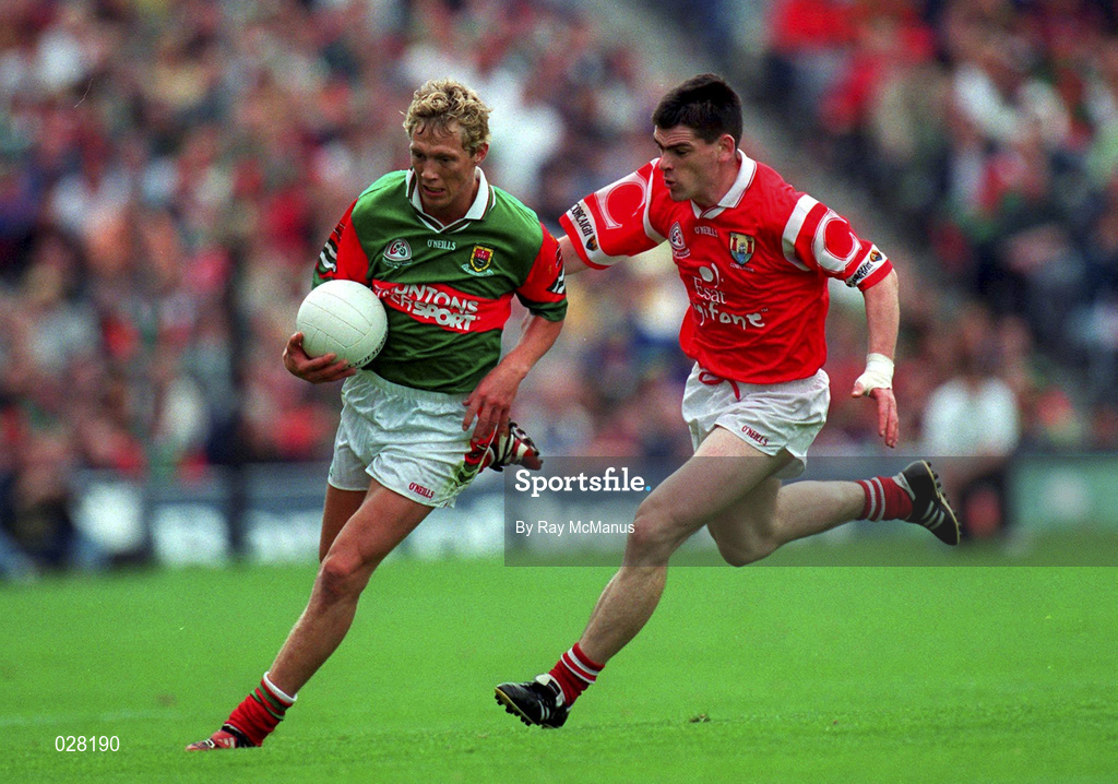 22 August 1999; Ciaran McDonald of Mayo in action against Michael Cronin of Cork during the Bank of Ireland All-Ireland Senior Football Championship Semi-Final match between Cork and Mayo at Croke Park in Dublin. Photo by Ray McManus/Sportsfile