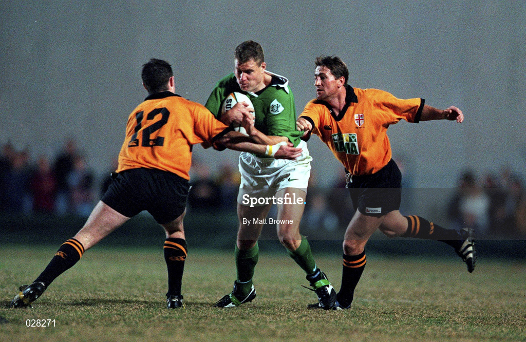5 June 1999; Matt Mostyn of Ireland in action against Craig Wills, left, and Steve Merrick of New South Wales Country during the Ireland Rugby tour to Australia match between New South Wales Country XV and Ireland at the Woy Woy Oval in New South Wales, Australia. Photo by Matt Browne/Sportsfile